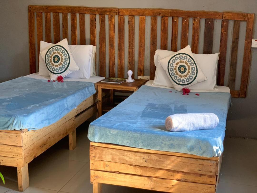 Jungle Breeze Home Stay คาซาเนอ ภายนอก รูปภาพ